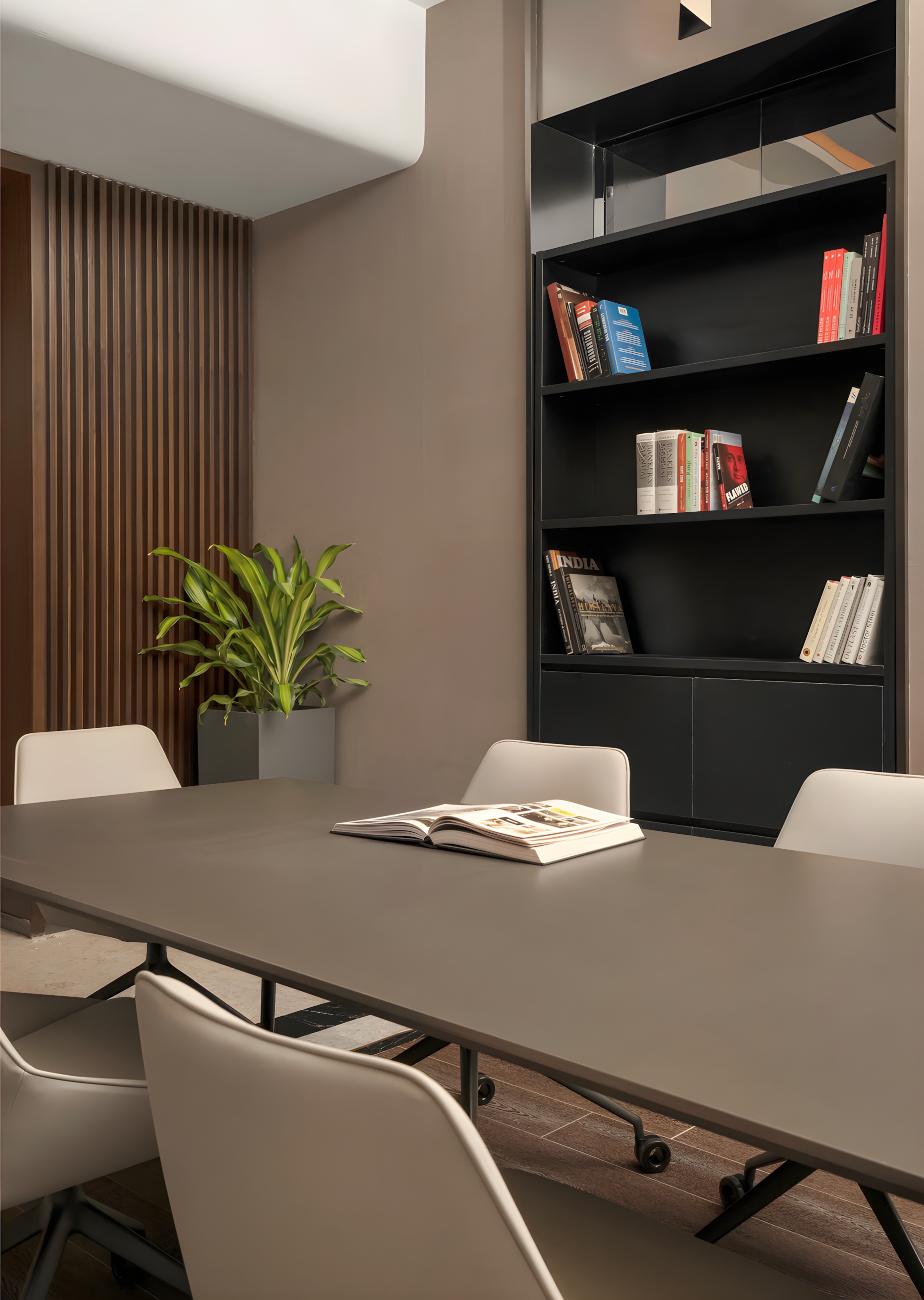 Timber-clad meeting room with integrated bookshelves